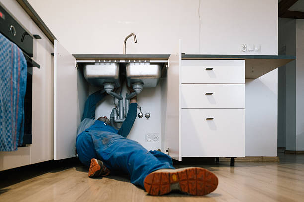 Professional Drain Cleaning technician working in Acme, PA